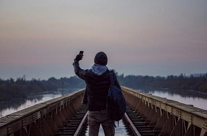 AP: Teen electrocuted while clicking selfie on train roof