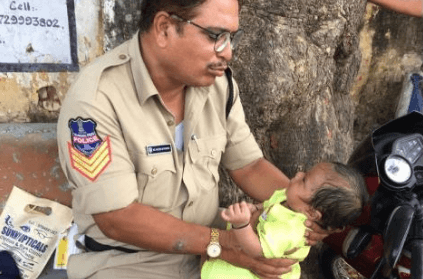 Telangana cop consoles crying baby while mother writes exam