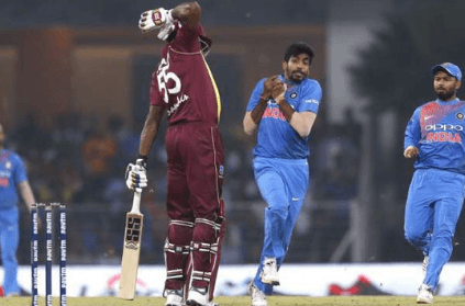 Keiron Pollard tries to distract Bumrah while taking catch