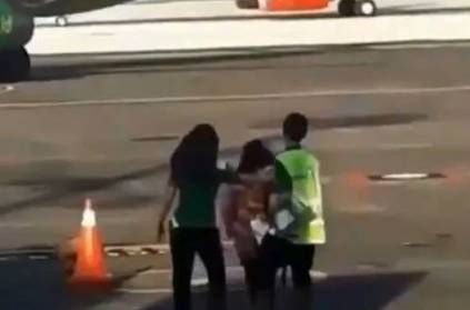 Women tries to chase down flight after she missed video goes viral