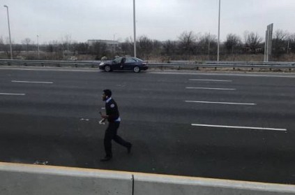 Cash spills on highway from truck - chaos ensues