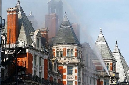 Over 100 firefighters rushed to put off fire on hotel roof