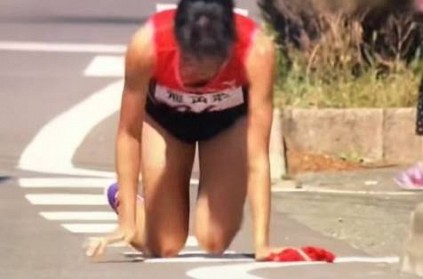 Watch - Japanese Runner crawls to finish line despite fractured foot