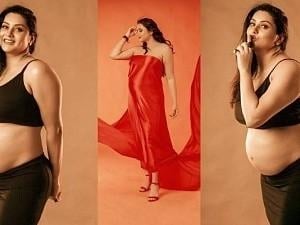 Actress Namitha glows in red gown in her maternity photoshoot - don't miss!