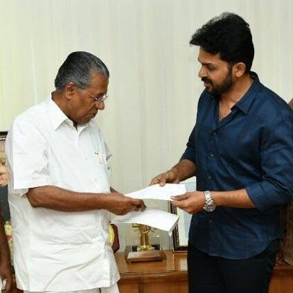 Karthi meets Kerala Chief Minister and donates 25 lakhs